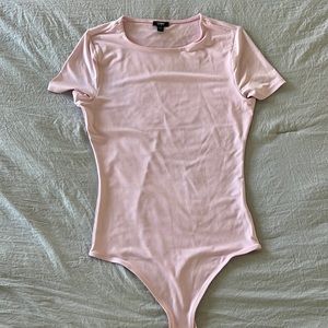 Light baby pink Express bodysuit